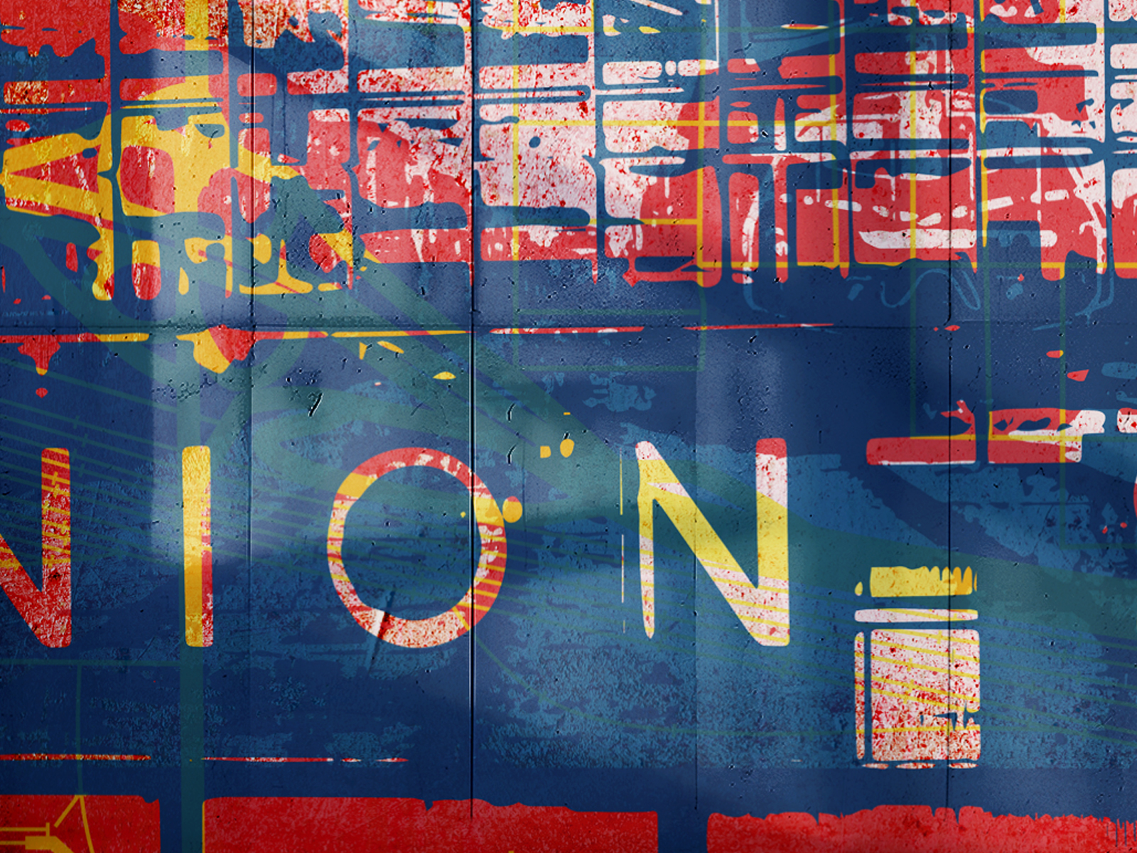 Abstract graffiti mural with bold red, blue, and yellow shapes and overlapping letters.